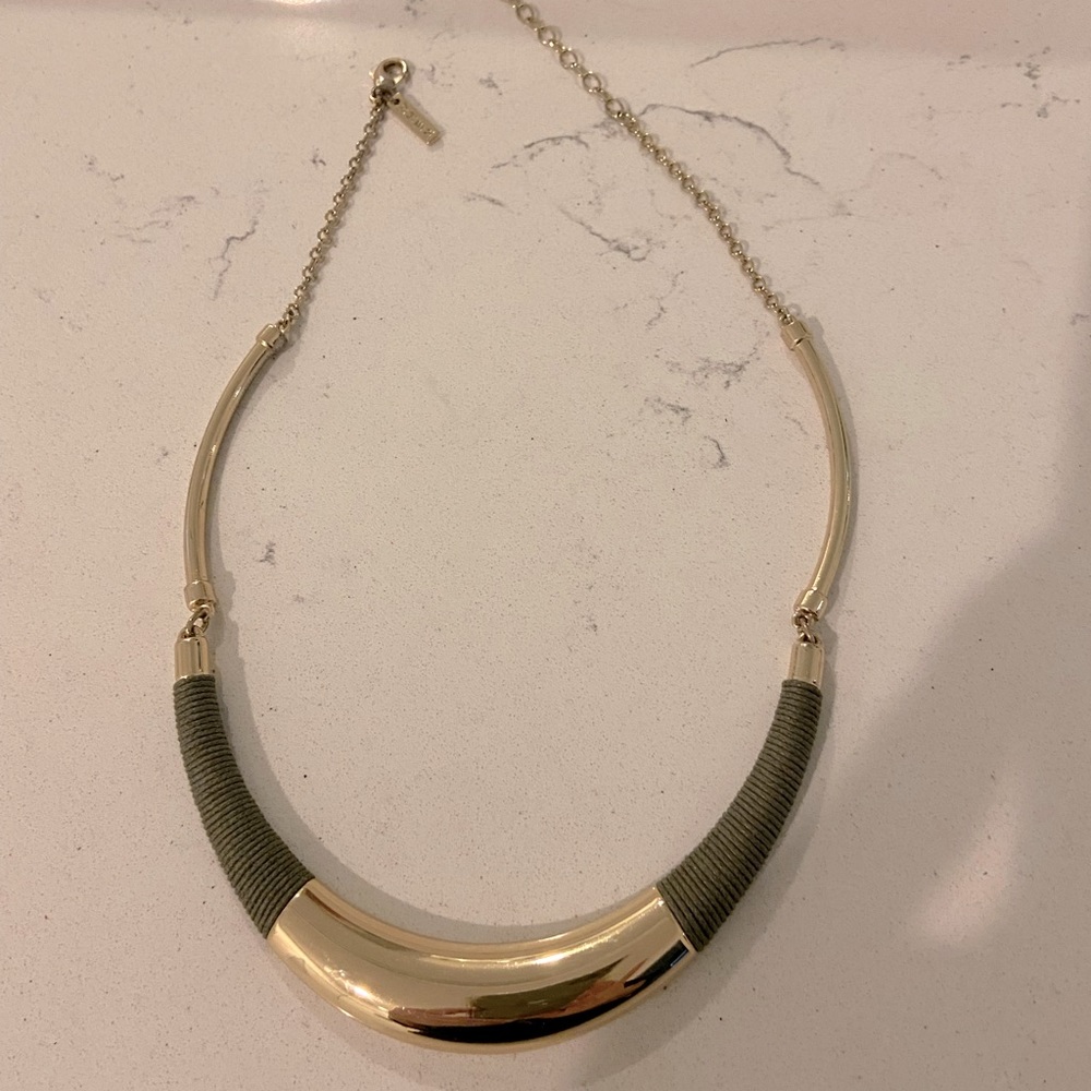 WHBM gold-tone necklace with moss green accents.